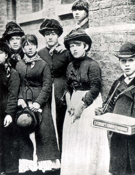 Black and white photo of several women who worked with match sticks