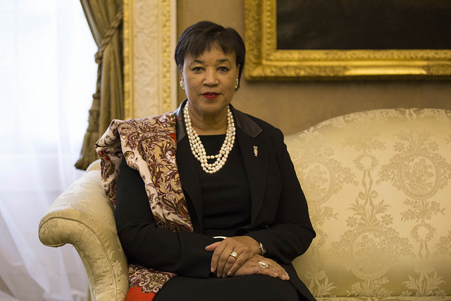 Colour photo of Patricia Scotland sitting on a couch