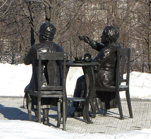 Colour photo of the statute of two women who challenged the women are persons law in Canada